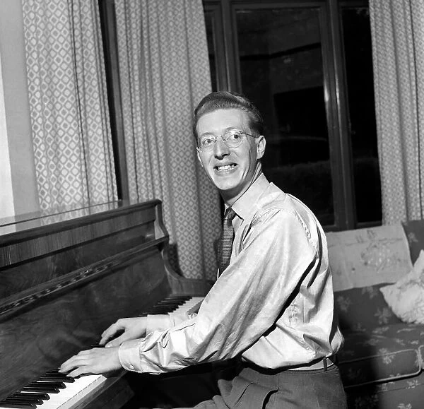 Music. Man playing Piano. September 1953 D5574-001