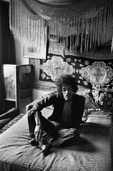Musician Jimi Hendrix in London at his Mayfair flat which was once the residence of