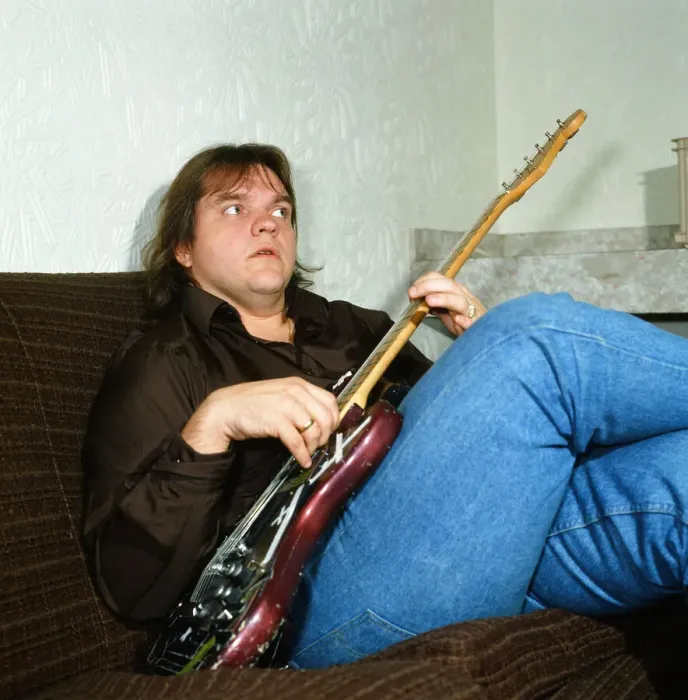 Framed Print : Musician Meat Loaf playing his guitar. September 1983 Framed Print : Musician Meat Loaf playing his guitar. September 1983