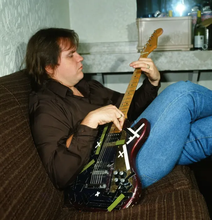 Framed Print : Musician Meat Loaf playing his guitar. September 1983 Framed Print : Musician Meat Loaf playing his guitar. September 1983