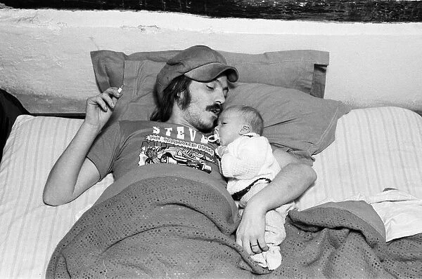 Musician Steve Marriott with his son Toby at their Essex home. 14th April 1976