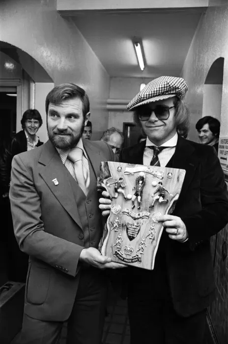 Framed Print : Musician and Watford FC chairman Elton John is presented with a special Jubilee plaque Framed Print : Musician and Watford FC chairman Elton John is presented with a special Jubilee plaque