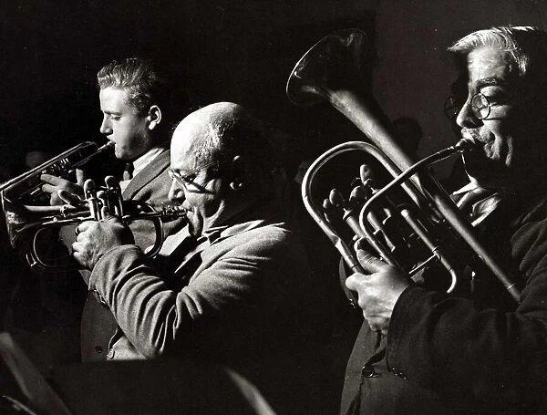 musicians, brass instruments - trumpet - tuba - brass band circa 1950