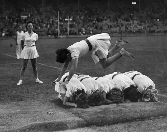 Framed Print : N. F.s girls do their agilities show for the crowd. Augurst 1943 P009986