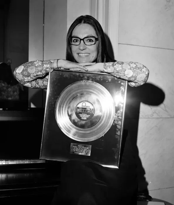 Framed Print : Nana Mouskouri, International Singing Star, is presented with a gold disc for her LP