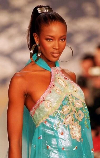 Naomi Campbell wears an elegant gownfor Gianfranco Ferre