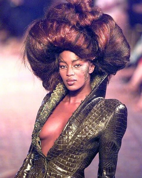 Naomi Campbell at the Paris Fashion Show 1997 wearing Givenchy fashions - a low cut