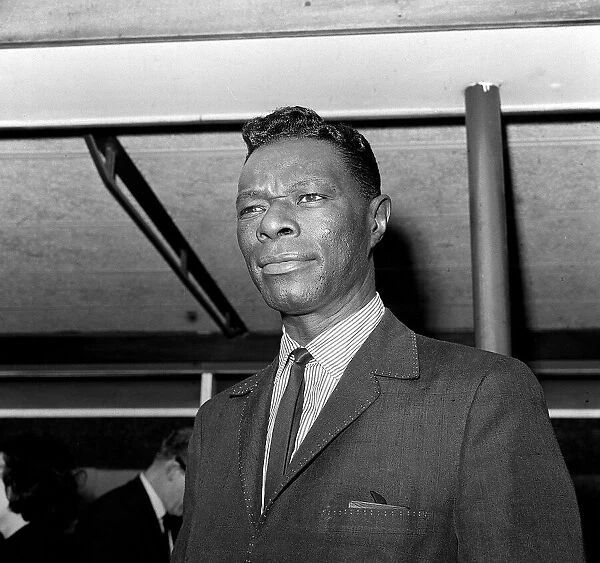 Nat King Cole arriving at London airport July 1963
