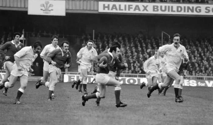 Framed Print : Five Nations 1977. England v Wales. Welsh captain Phil Bennett running with Framed Print : Five Nations 1977. England v Wales. Welsh captain Phil Bennett running with