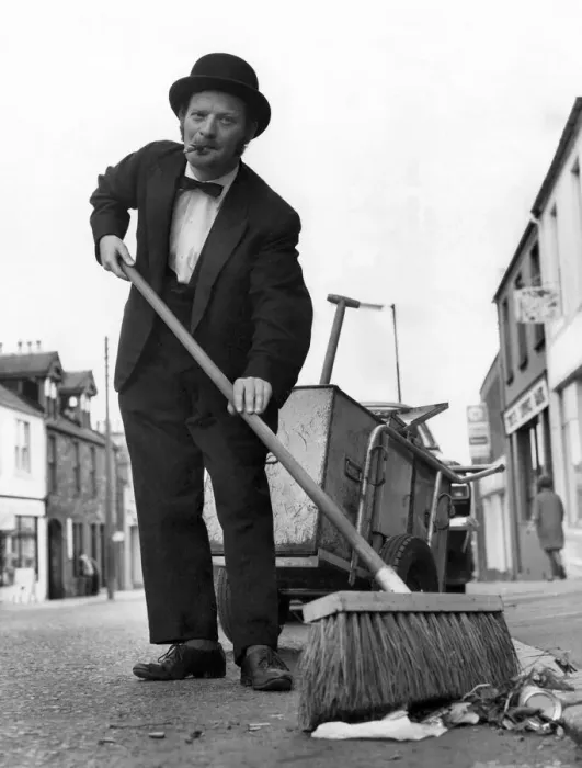 Framed Print : Natty Sam cleans up. Dustman Sam McKill is dressed to kill as he goes on his daily rounds