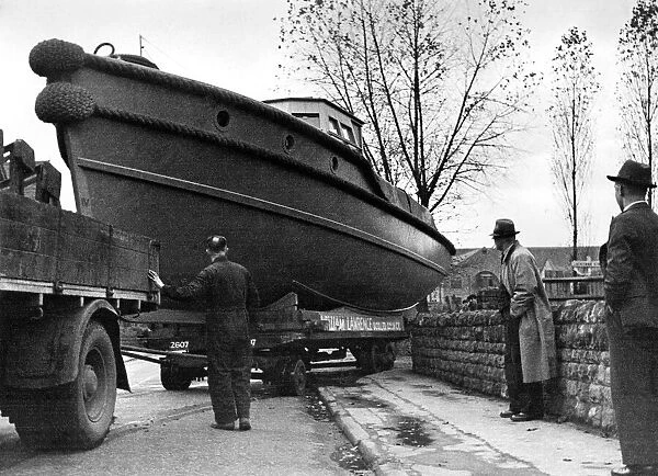 When this naval liberty boat is completed in the yard of a midland town