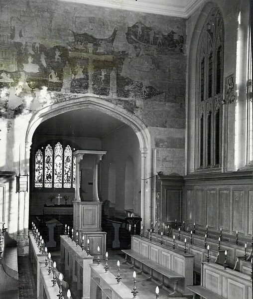 The nave at Stratford Guild Chapel in its restored state with oak benches running