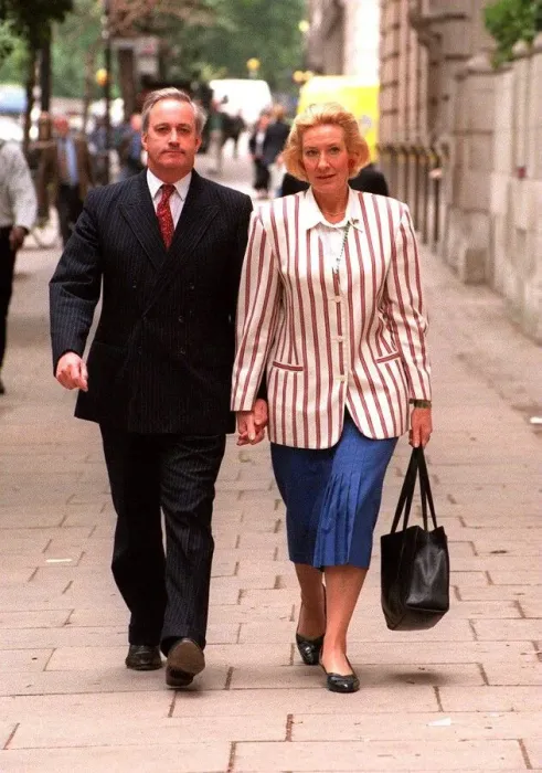 Framed Print : Neil Hamilton former MP for Tatton with his wife Christine near Millbank Westminster Framed Print : Neil Hamilton former MP for Tatton with his wife Christine near Millbank Westminster