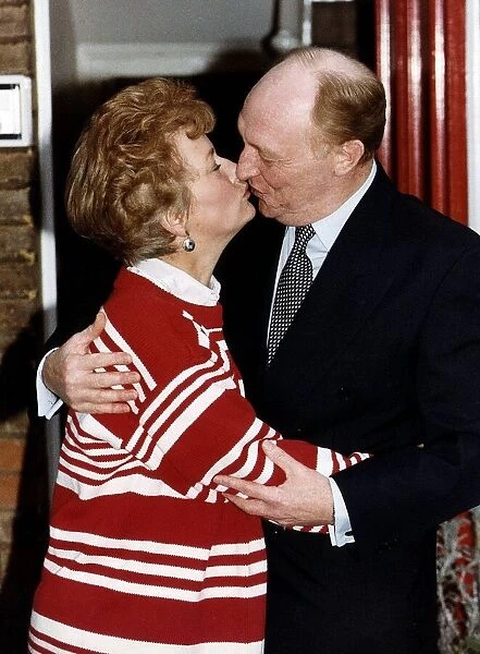 Neil Kinnock MP and wife Glenys Kinnock MEP kiss on the occasion of their 25th wedding