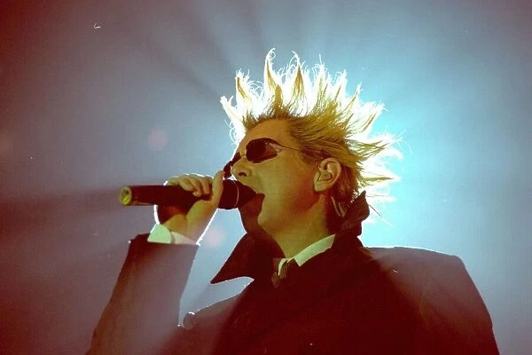 Neil Tennant of The Pet Shop Boys on stage at the Newcastle Telewest Arena. 07  /  12  /  99