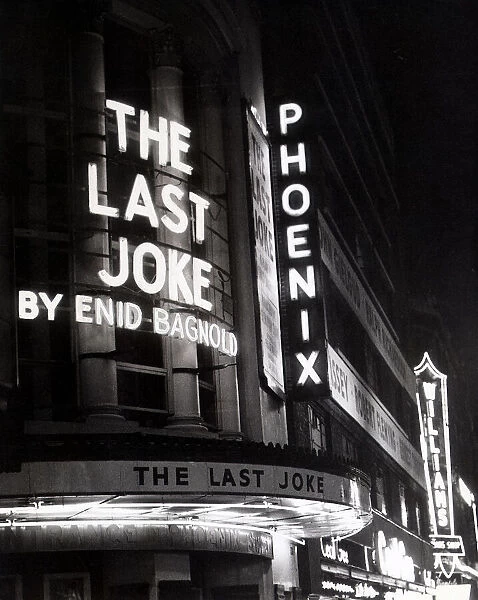 Neon lights advertise the play 'The Last Joke'