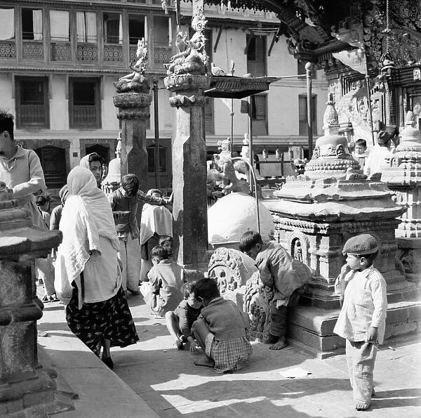 Nepalese children playing around the Changnarayan Temple in Katmandu the capital of