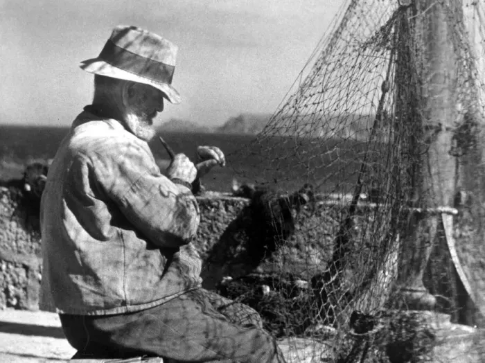 Framed Print : Net making, a fisherman in Cornwall, circa January 1944 Framed Print : Net making, a fisherman in Cornwall, circa January 1944