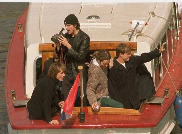 Take That in the Netherlands after their final concert, leaving on a canal tazi as fans