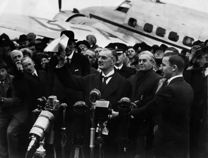 Framed Print : Neville Chamberlain seen here at Heston Airport after returning from his summit meeting