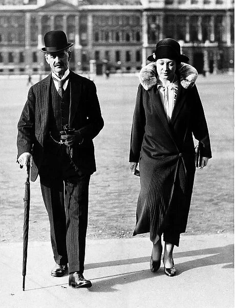 Neville Chamberlain with wife at Buckingham