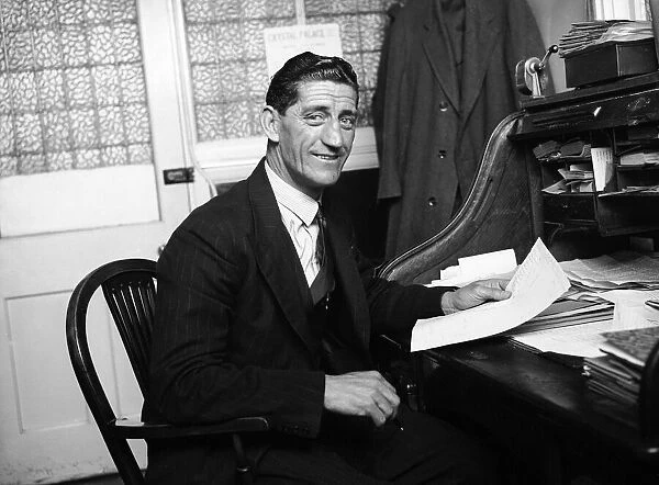 New Crystal Palace manager Ronnie Rooke in his office. 2nd May 1949