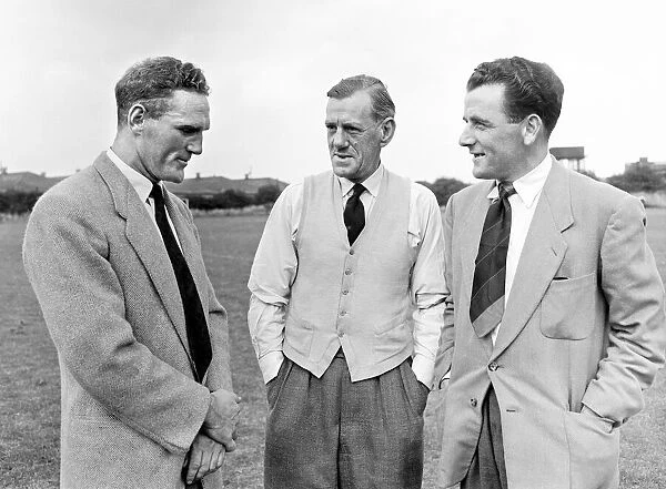 New Derby County manager Harry Storey (centre) with new players Paddy Ryan (right