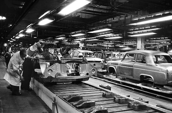 New Ford Anglia cars coming off the production line at the new Ford paint