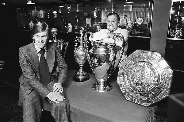 New Liverpool signing Kenny Dalglish with manager Bob Paisley in the trophy room at