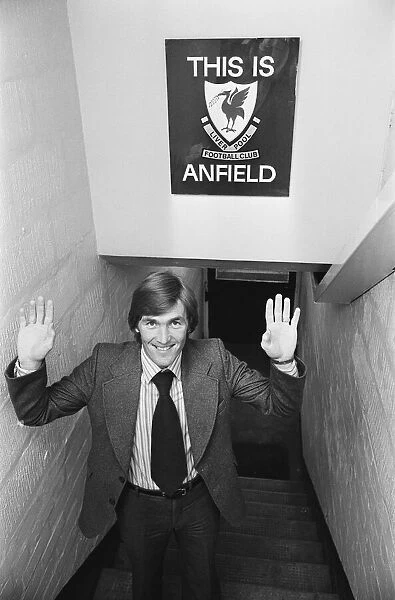 New Liverpool signing Kenny Dalglish poses by the famous sign in the tunnel at Anfield