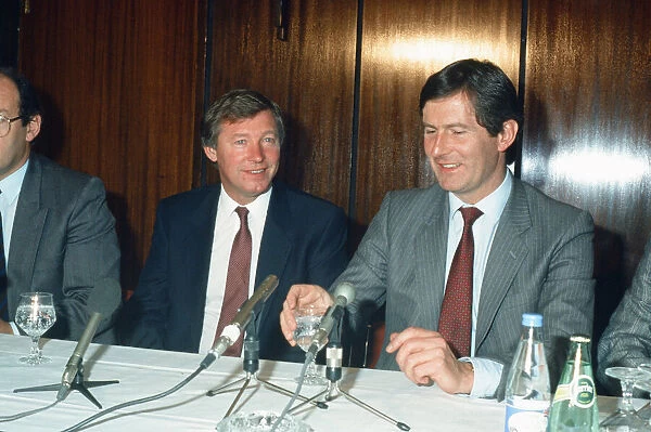 New Manchester United manager Alex Ferguson at a press conference with chairman Martin