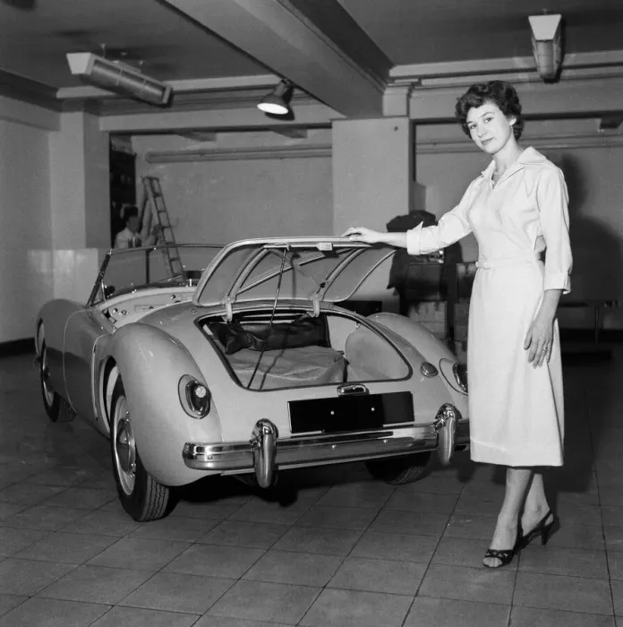 Framed Print : A new MG car on display in a showroom. 22nd September 1955 Framed Print : A new MG car on display in a showroom. 22nd September 1955