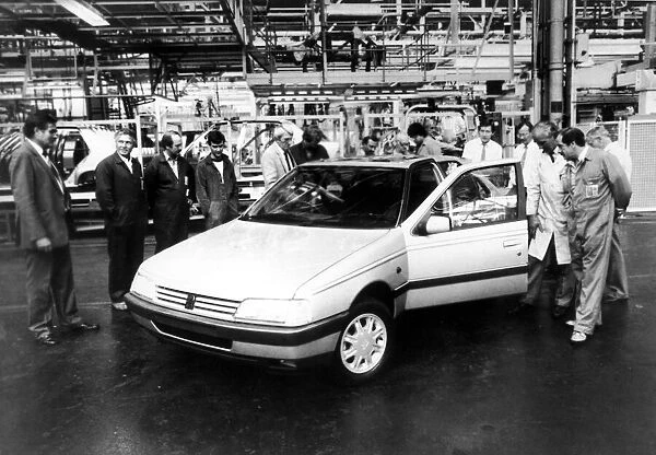 A new Peugeot rolls off the production line at the Peugeot factory at Ryton