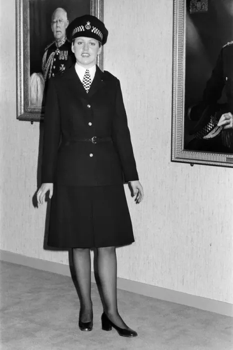 Framed Print : The new Police image. W. P. C Leslie Cosburn, left, (21) from Bow shows off the stylish new