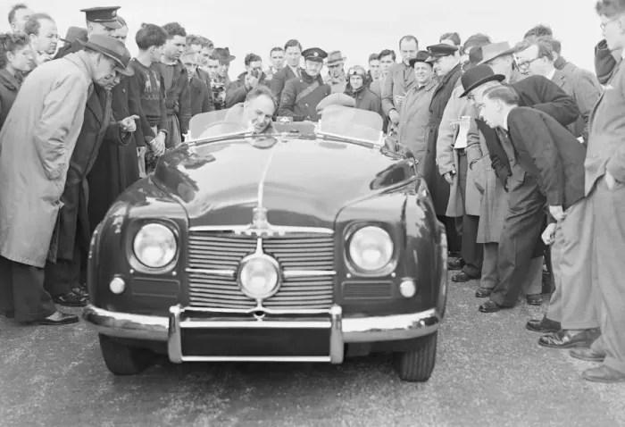 Framed Print : New Rover gas turbine car tested at Silverstone By C Wilkes with T R Bell as passenger Framed Print : New Rover gas turbine car tested at Silverstone By C Wilkes with T R Bell as passenger