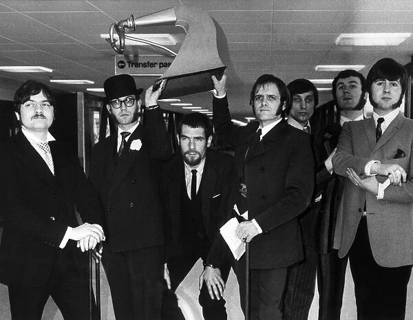 The New Vaudeville Band leaving London Airport for Los Angeles where they go to
