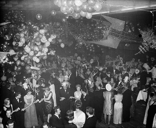New Year Eve revellers sing Auld Lang Syne at the Leofric Hotel, Coventry