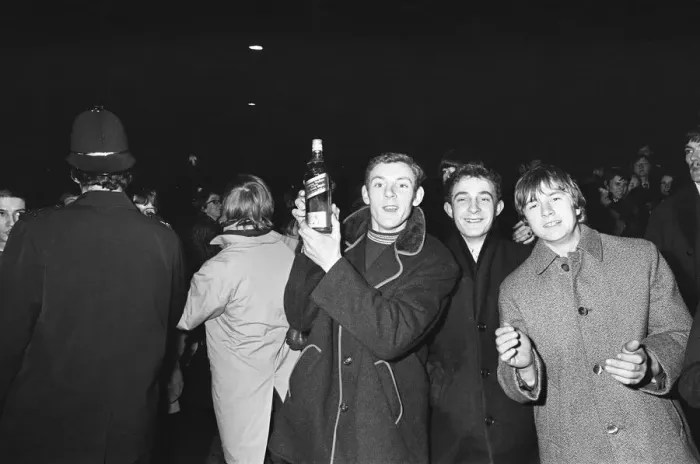 Framed Print : New Years revellers seen here celebrating seeing in 1970 in Ratcliffe Place