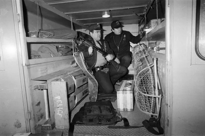 Framed Print : Two New York Policemen in the back of their truck with their equipment Framed Print : Two New York Policemen in the back of their truck with their equipment