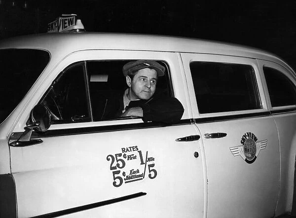 New York yellow taxi driver Michael Gandiosa. 18th November 1955