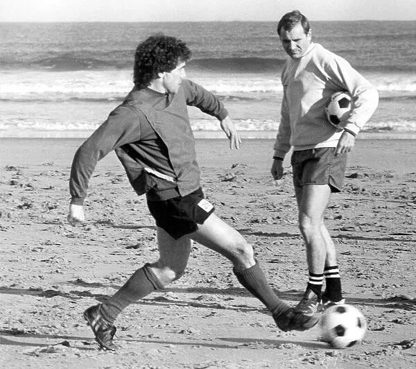 Newcastle skipper Kevin Keegan in training on the beach with manager Arthur Cox