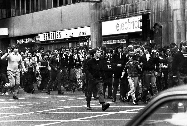 Newcastle United Supporters march along Pilgrim Street in Newcastle 25  /  03  /  80