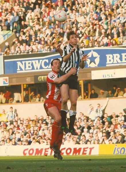 Newcastle United v Brentford 28 February 1993 - David Kelly challenges for the ball
