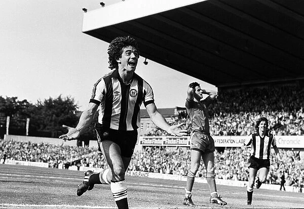 Newcastle United's Kevin Keegan celebrates after scoring a goal on his debut at St