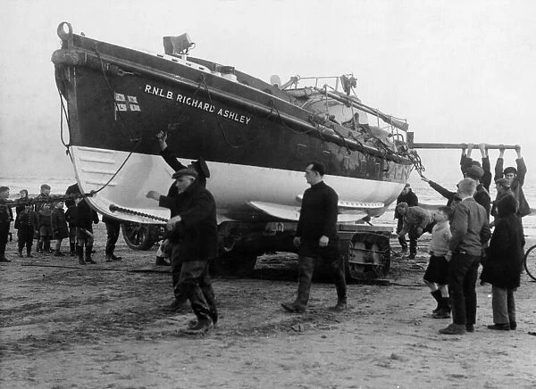 The newly repaired Liverpool Class Newbiggin lifeboat Richard Ashley is hauled on to its