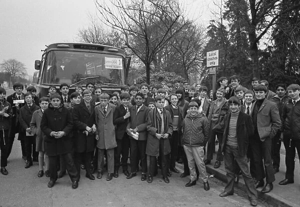Newspaper delivery boys of Leamington ready top board a coach to take them to see