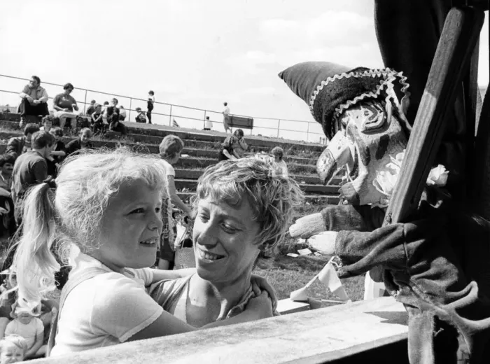 Framed Print : Nice to see you, says Mr Punch to little Jacqueline McGrath of Redcar at British Framed Print : Nice to see you, says Mr Punch to little Jacqueline McGrath of Redcar at British
