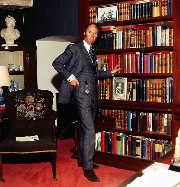 Nicholas Fairbairn in his library October 1982