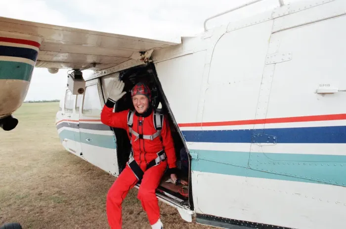 Framed Print : Nicholas Parsons, TV Presenter and actor, preparing for a tandem skydive