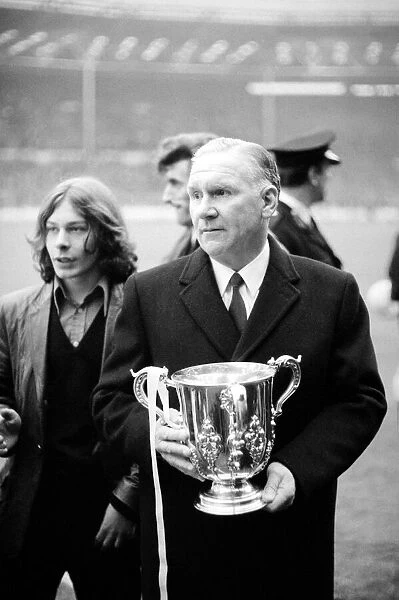 Bill Nicholson of Tottenham Hotspur - February 1971 holding the winning League Cup